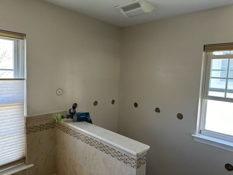 bathroom wall insulation access holes above tub nj