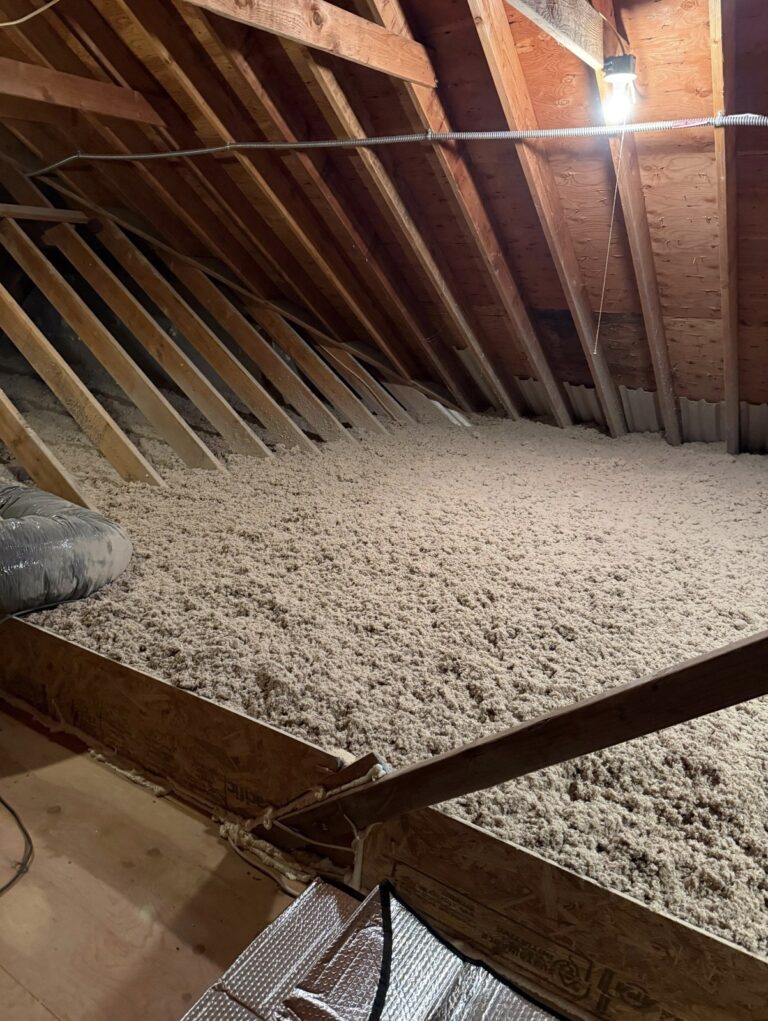 blown in cellulose between attic framing