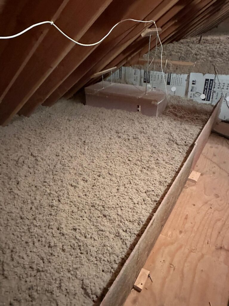 cellulose attic insulation along raised walkway nj