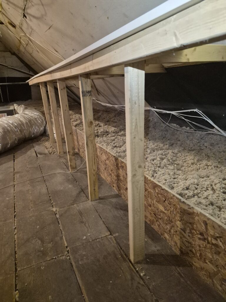 cellulose insulation behind attic framing