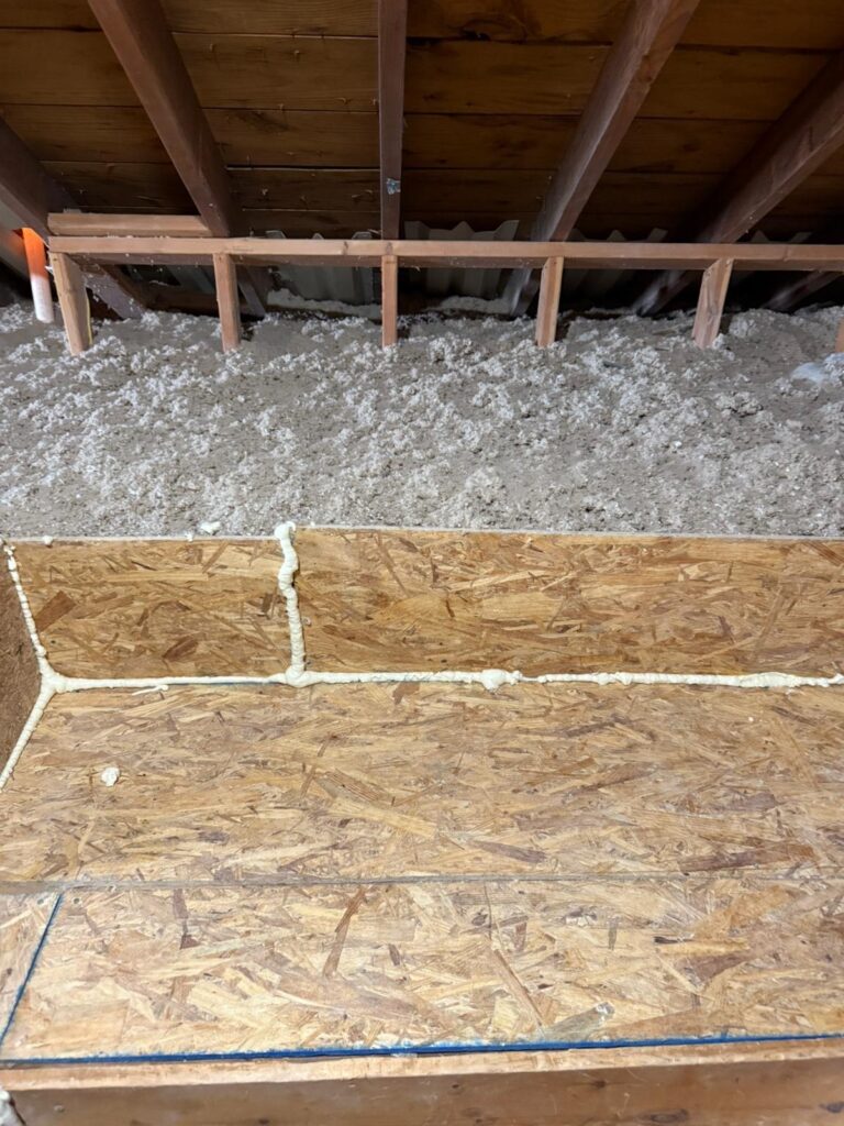 cellulose insulation behind plywood retaining edge