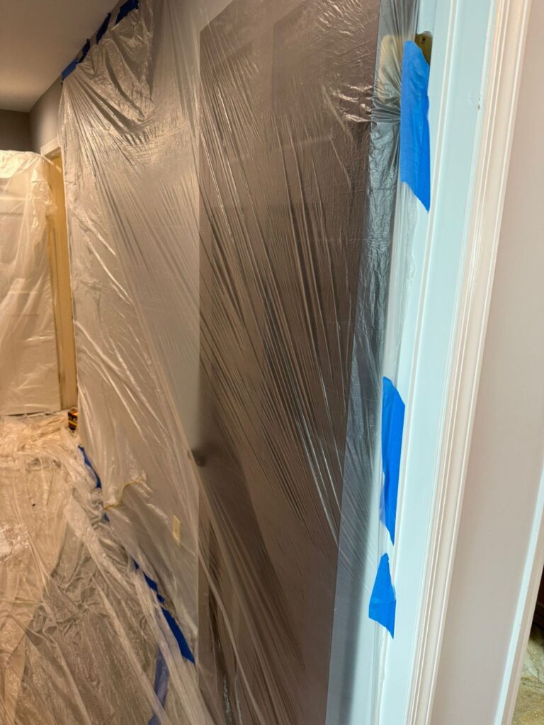 doorway and wall masked for interior work