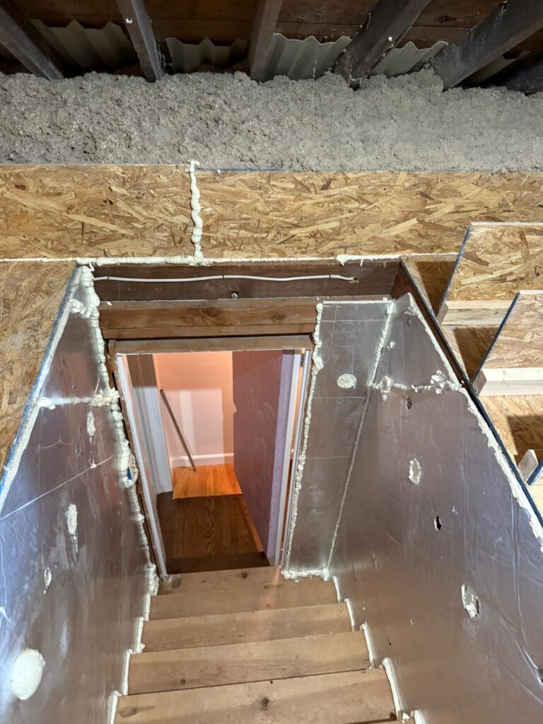 foil lined pull down attic stair opening