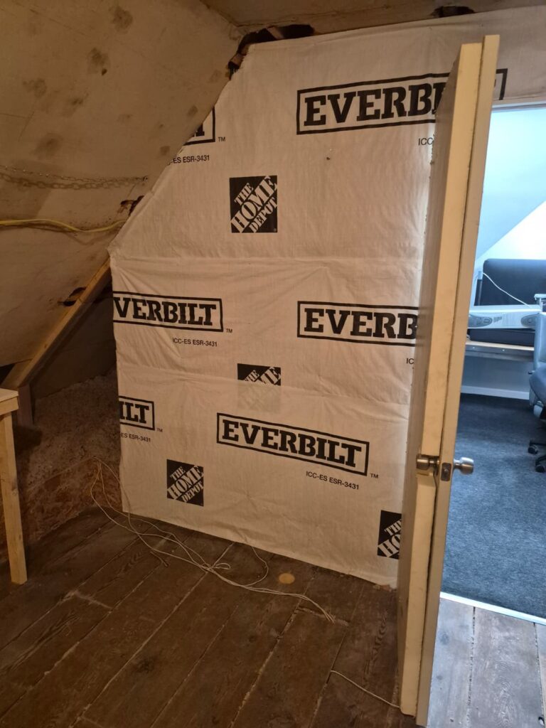 housewrap covered attic knee wall