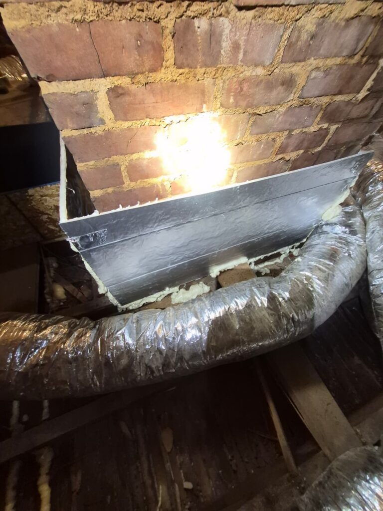 metal flashing around attic chimney