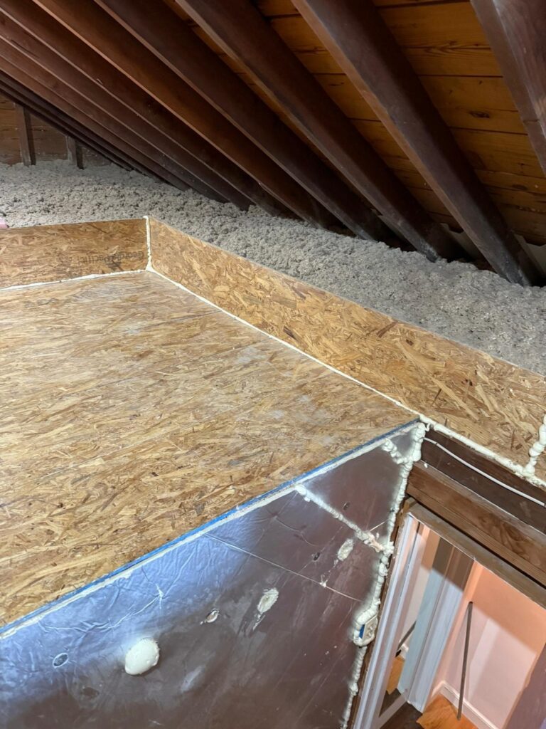 raised attic storage deck and access opening