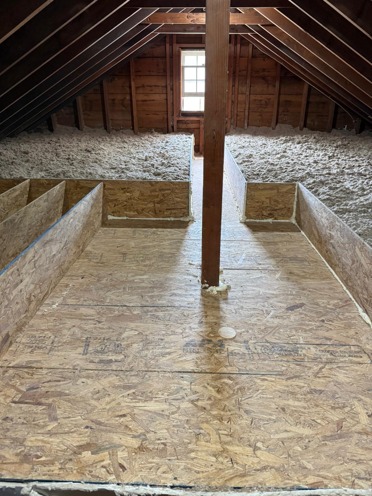 raised attic storage platform with cellulose