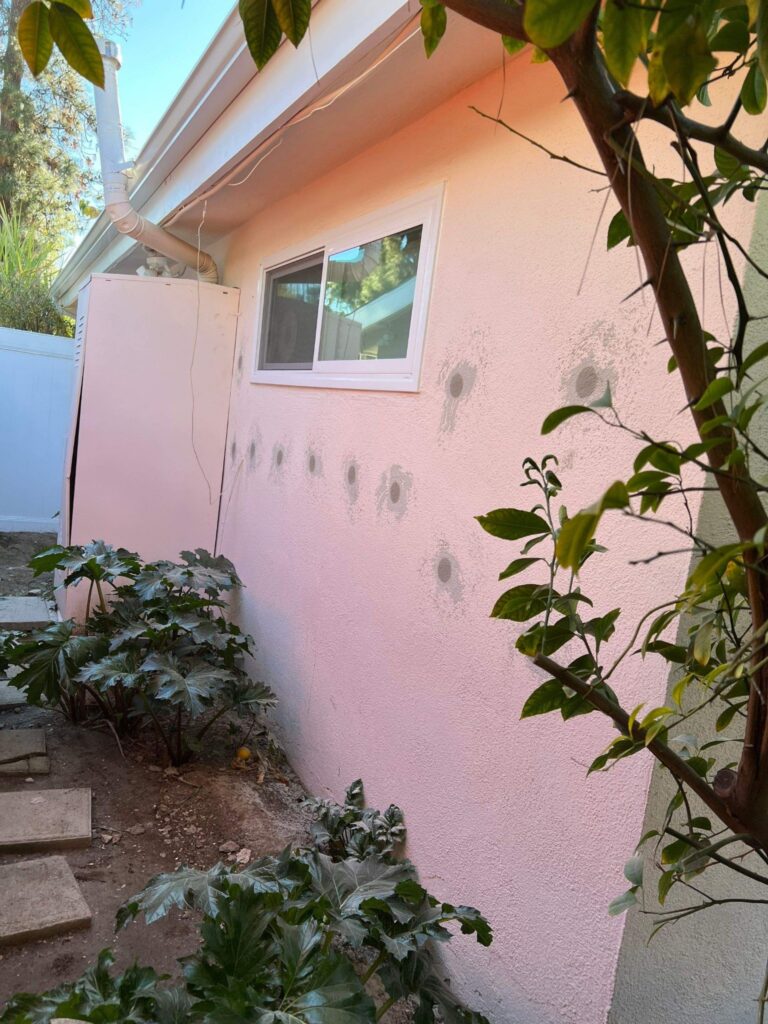 stucco wall insulation patched holes around window nj