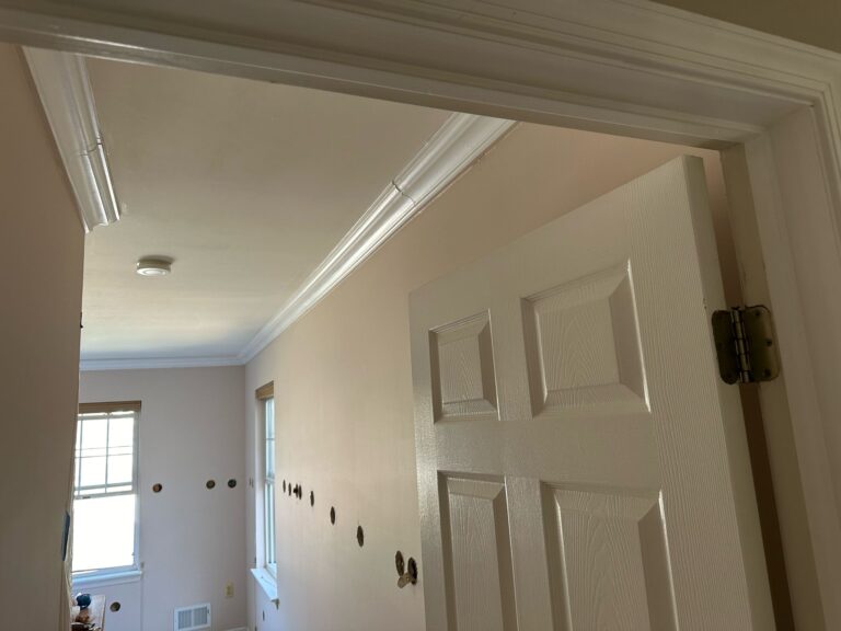 wall insulation drill holes view through doorway nj